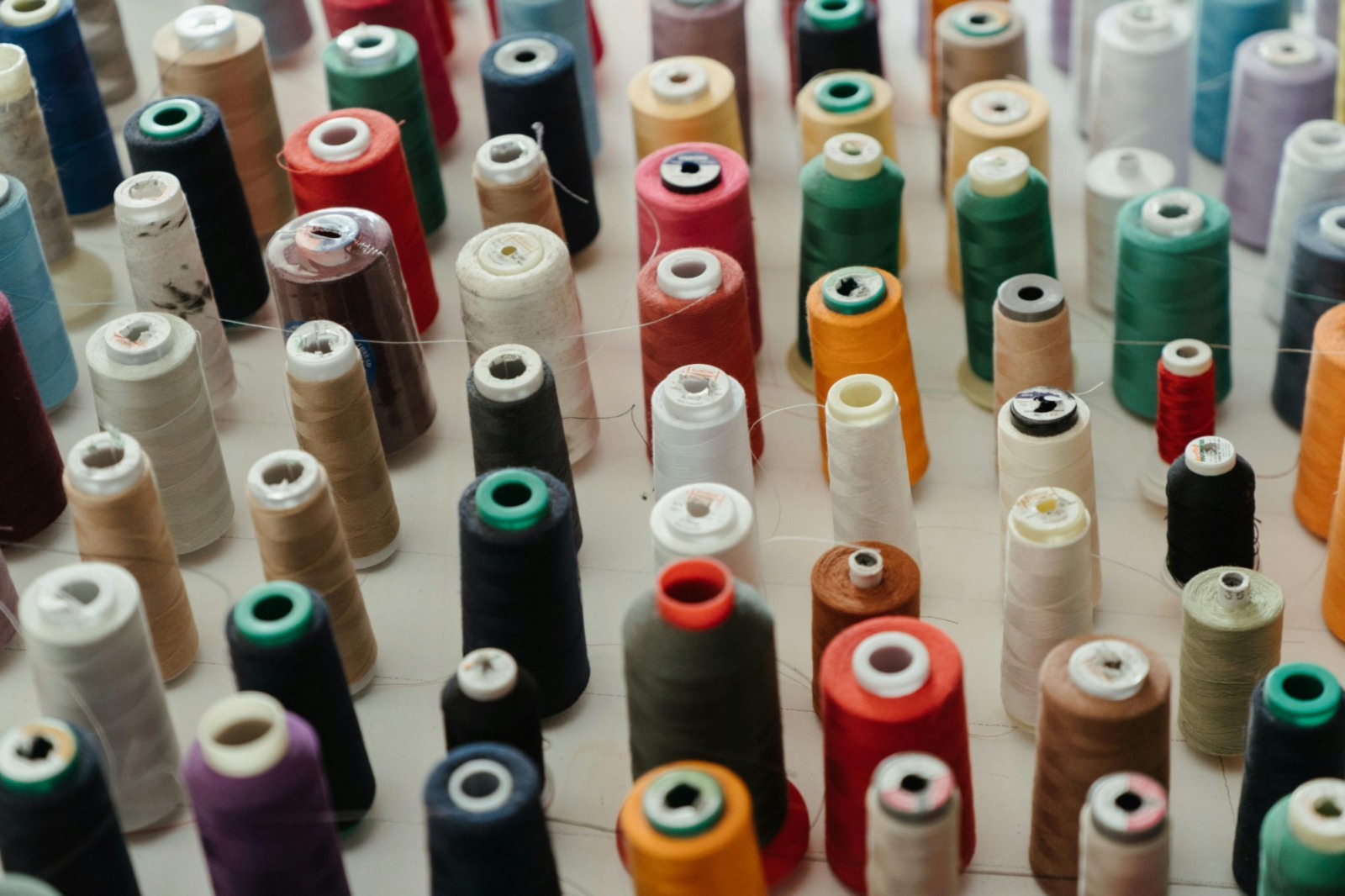 Textile thread spools